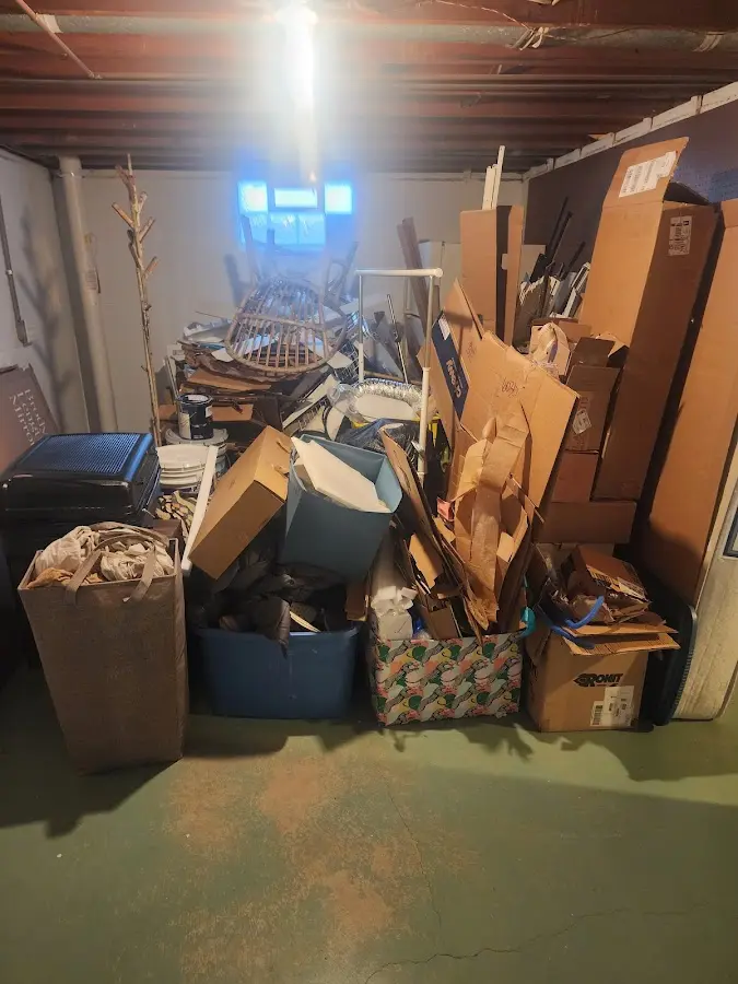 Roll-off dumpster container at job site for 4 Yard Dumpster Rental in Flora